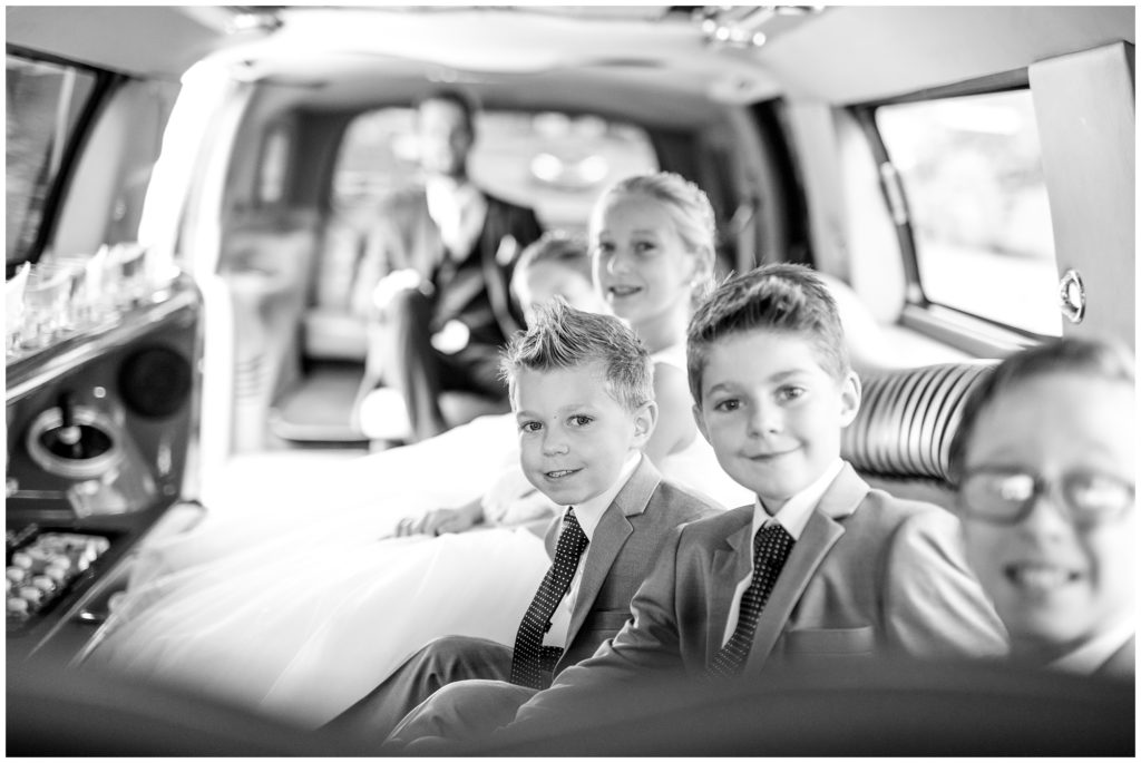 Aiden Laurette Photography | Ontario Wedding Photographer | wedding party in the limo