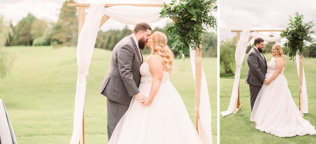 aiden laurette photography | bride and groom standing in front of alter kissing