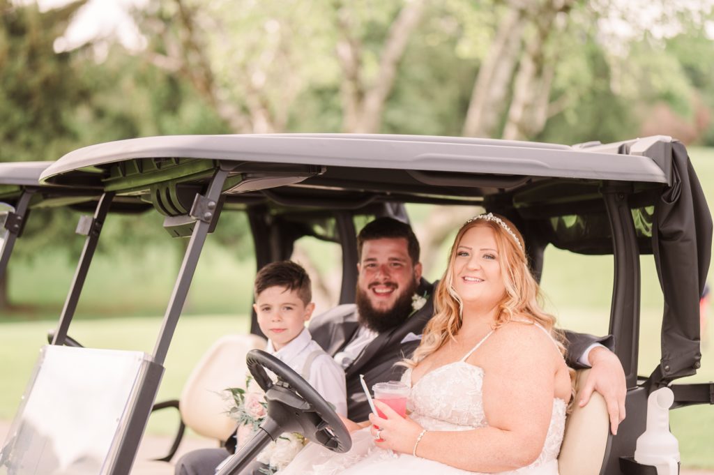 aiden laurette photography | boy, bearded man and red headed woman sitting in golf cart