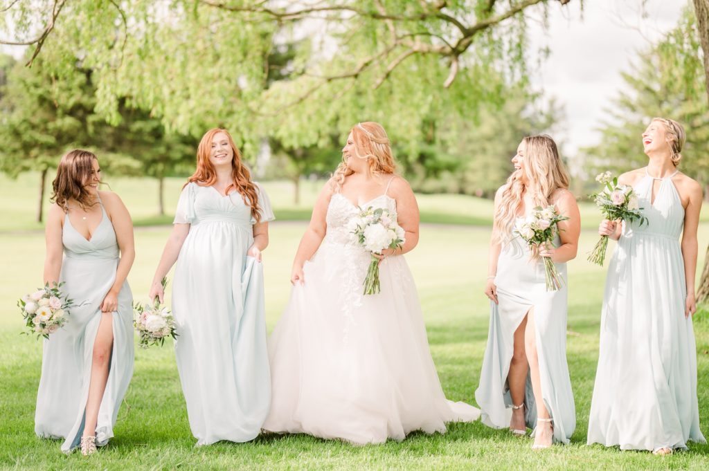aiden laurette photography | group of women laughing under tree