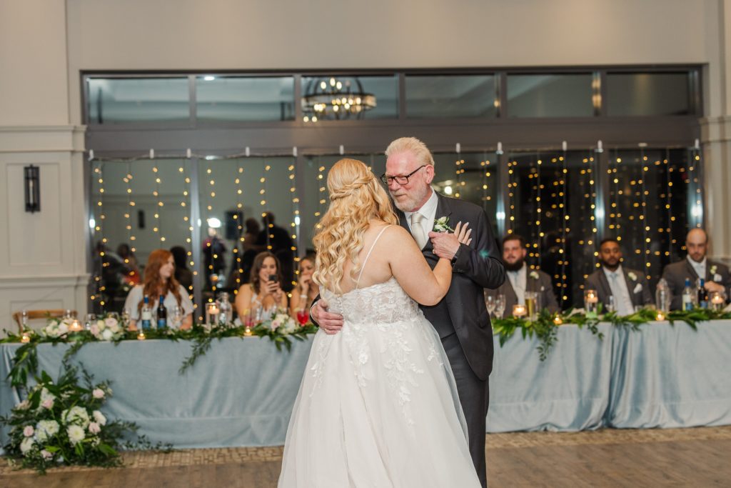 aiden laurette photography | bride and white haired man in formal attire dancing and conversing
