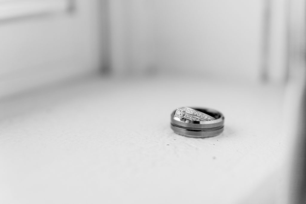 Aiden Laurette Photography | close up black and white photo of wedding rings