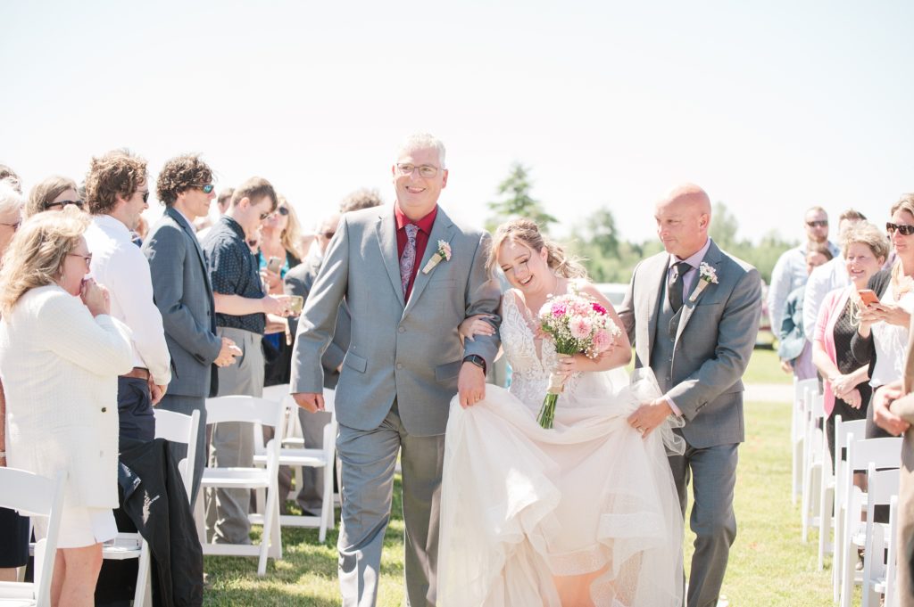 Aiden Laurette Photography | men walk with bride down the aisle