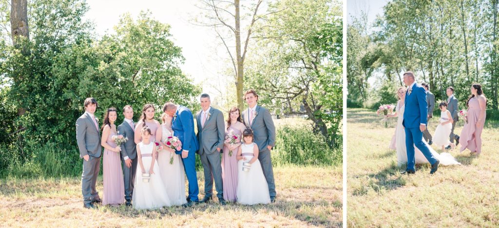 Aiden Laurette Photography | bride and groom and wedding party pose in front of greenery