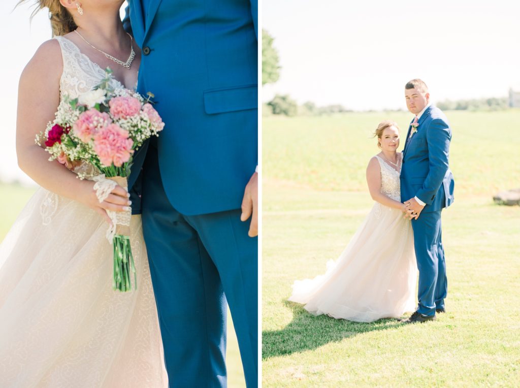 Aiden Laurette Photography | bride and groom pose in front of field