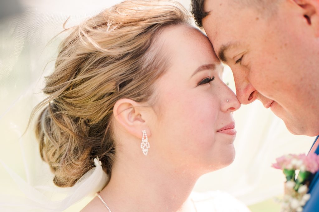 Aiden Laurette Photography | close up photo of bride and groom