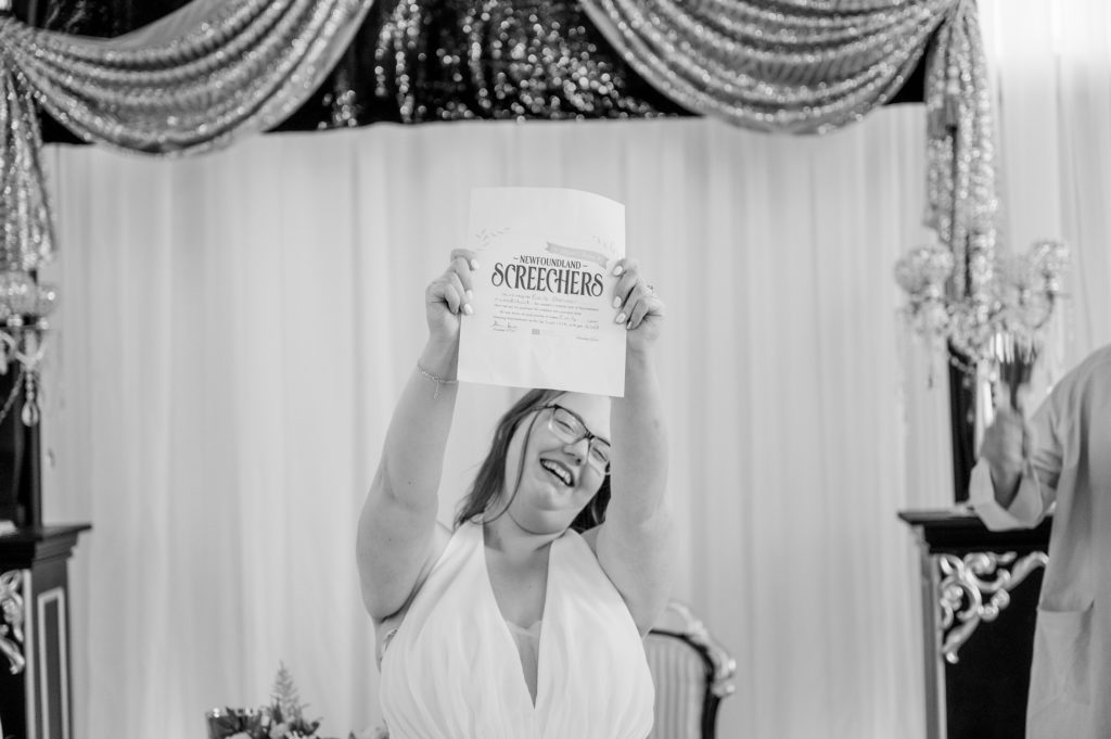 Aiden Laurette Photography | bride holds up document