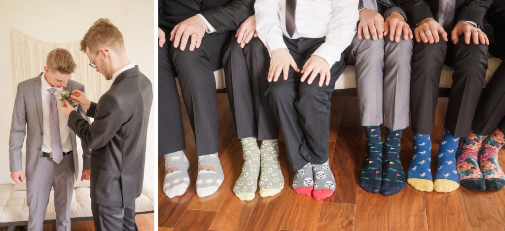 Aiden Laurette Photography | man in dark grey suit pins flower boutineer on man in light grey close up of suit six men sitting down with printed socks showing