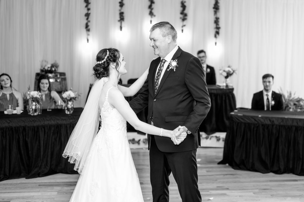 Aiden Laurette Photography | black and white photo of man and bride on dancefloor