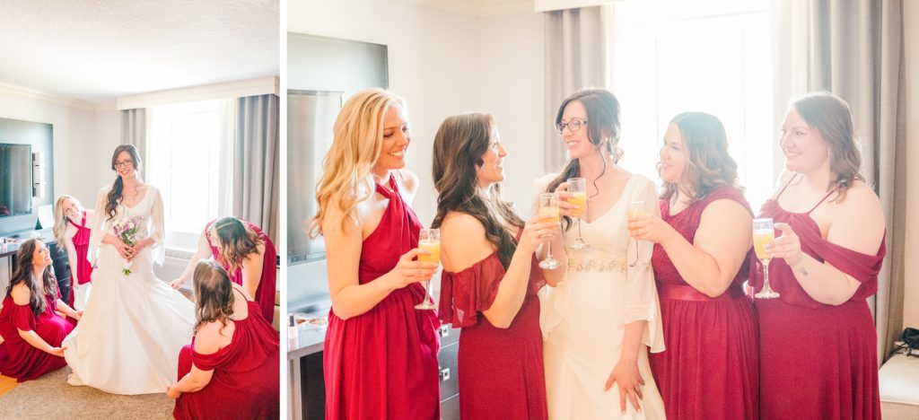 Aiden Laurette Photography | woman in white wedding dress stands and smiles with bridesmaids