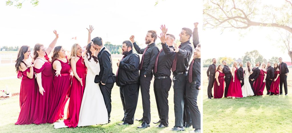 Aiden Laurette Photography | wedding party looks on as bride and groom kiss
