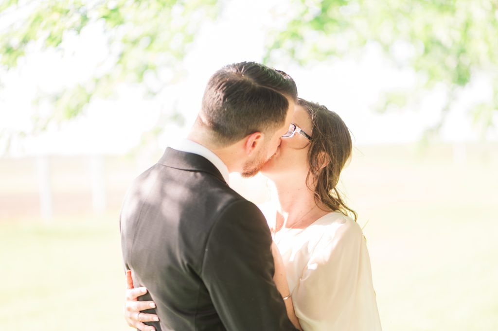 Aiden Laurette Photography | bride and groom kiss