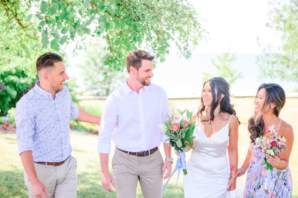Aiden Laurette Photography | two men and two women walk and laugh