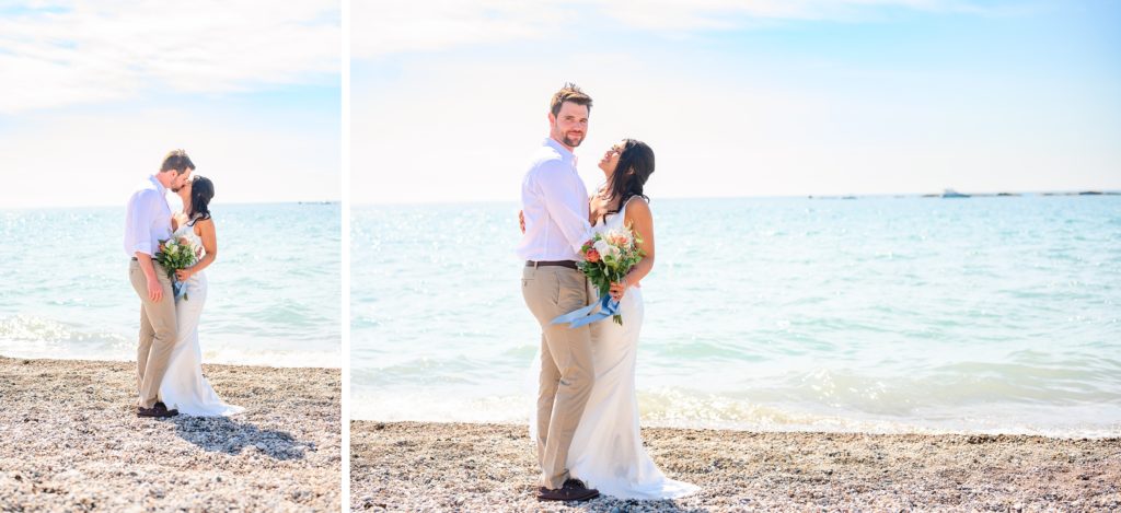 Aiden Laurette Photography | bride and groom stand on beach in front of water