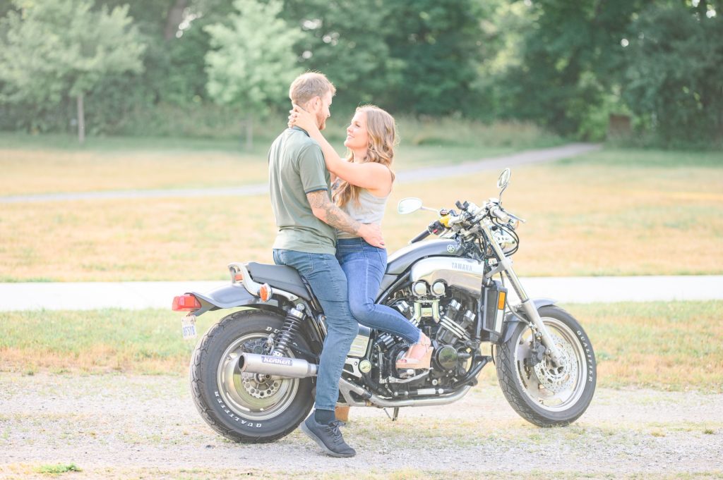 Aiden Laurette Photography | Man and woman sit on motorcycle