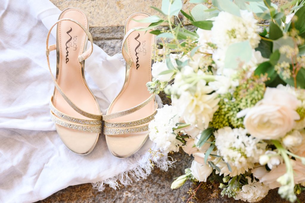 Aiden Laurette Photography | close up photo of wedding flowers and wedding shoes