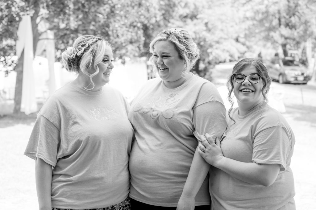 Aiden Laurette Photography | black and white photo of three women laughing
