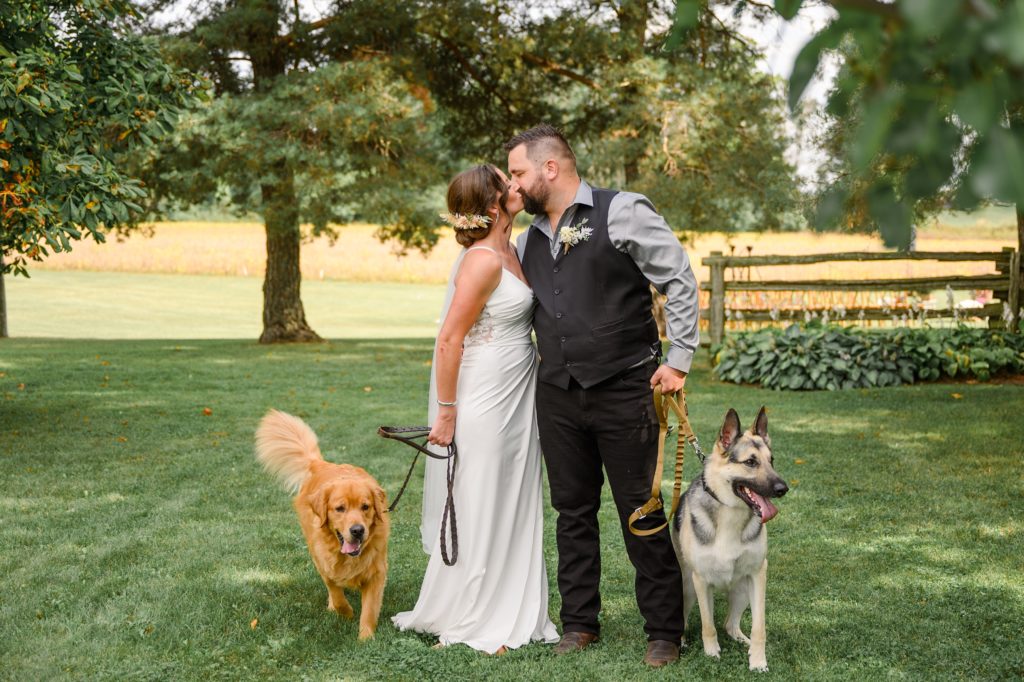 Aiden Laurette Photography | bride and groom with dogs