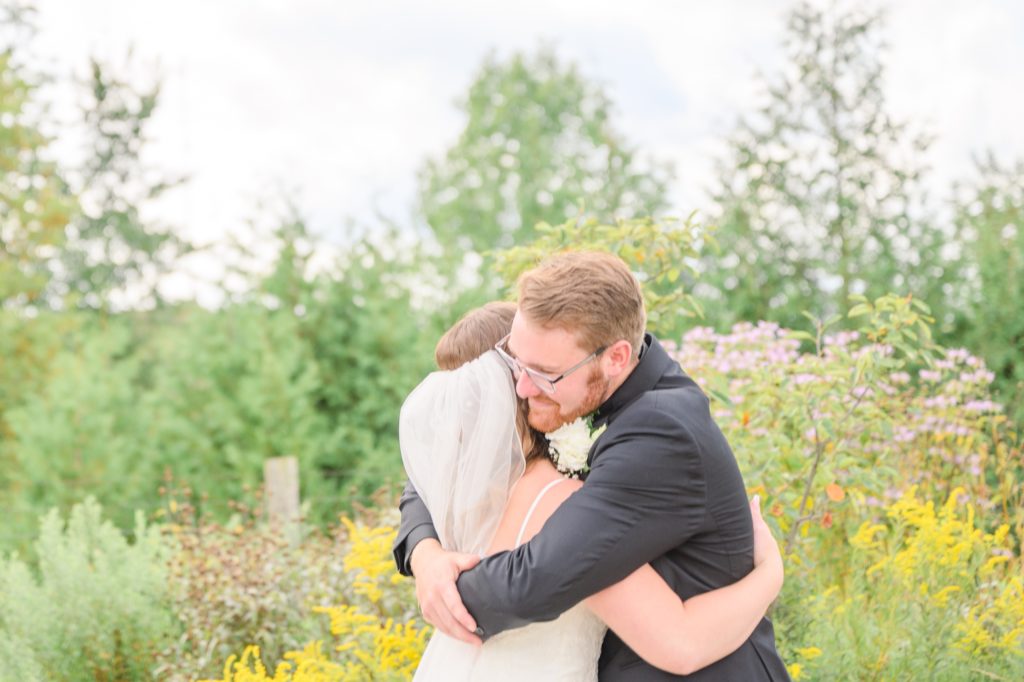 Aiden Laurette Photography | bride and groom hug hanover
