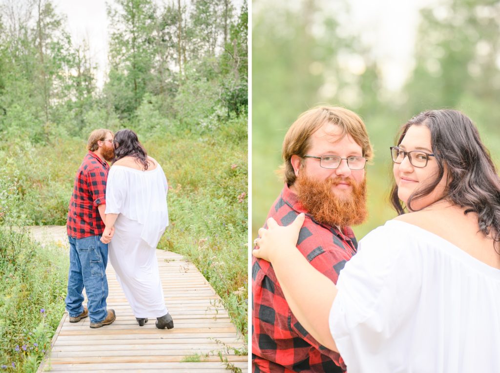 Aiden Laurette Photography | Woman in white dress and man in plaid shirt pose on path