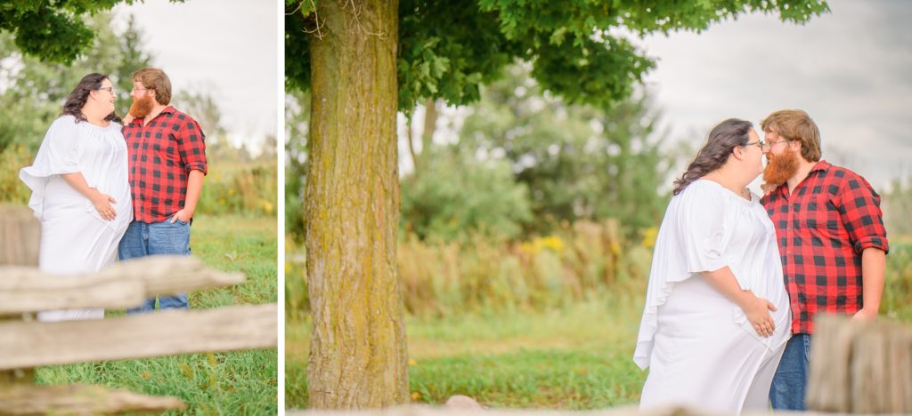 Aiden Laurette Photography | Woman in white dress and man in plaid shirt embrace in field