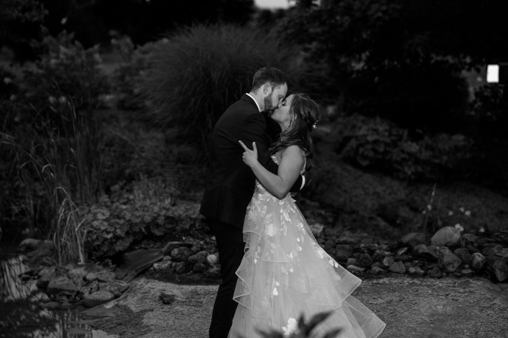 Aiden Laurette Photography | bride and groom pose in scenery