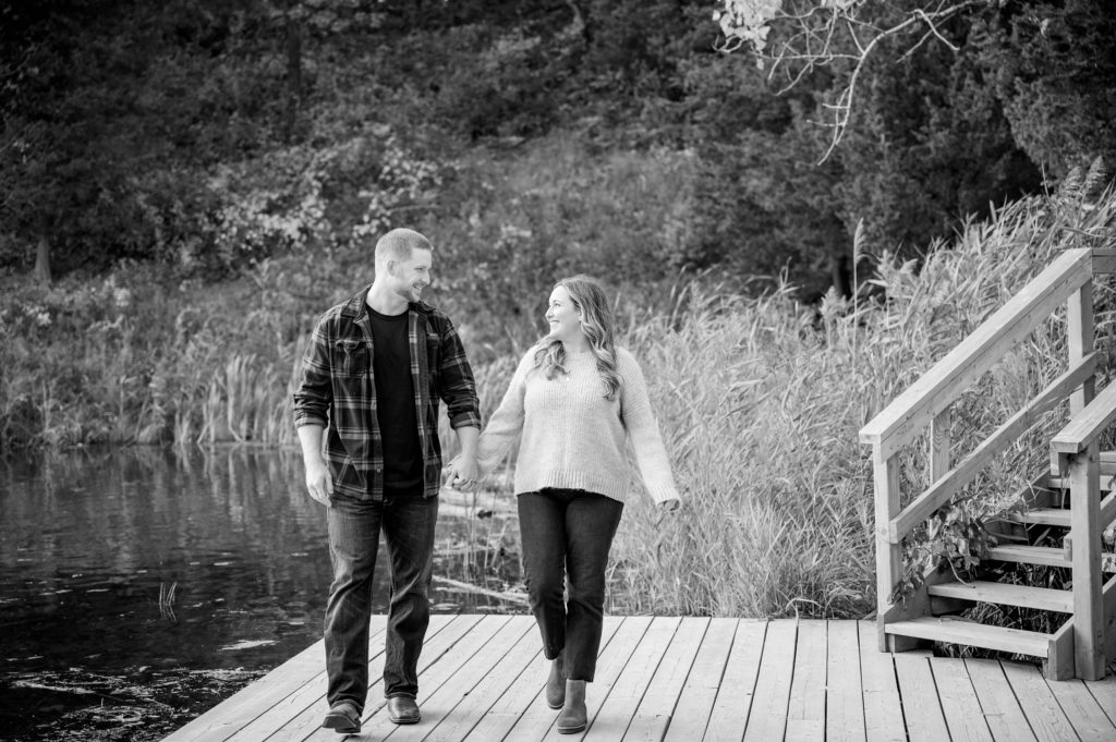 Aiden Laurette Photography | man and woman walk on dock