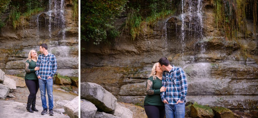 Aiden Laurette Photography | Man and woman pose in front of waterfall