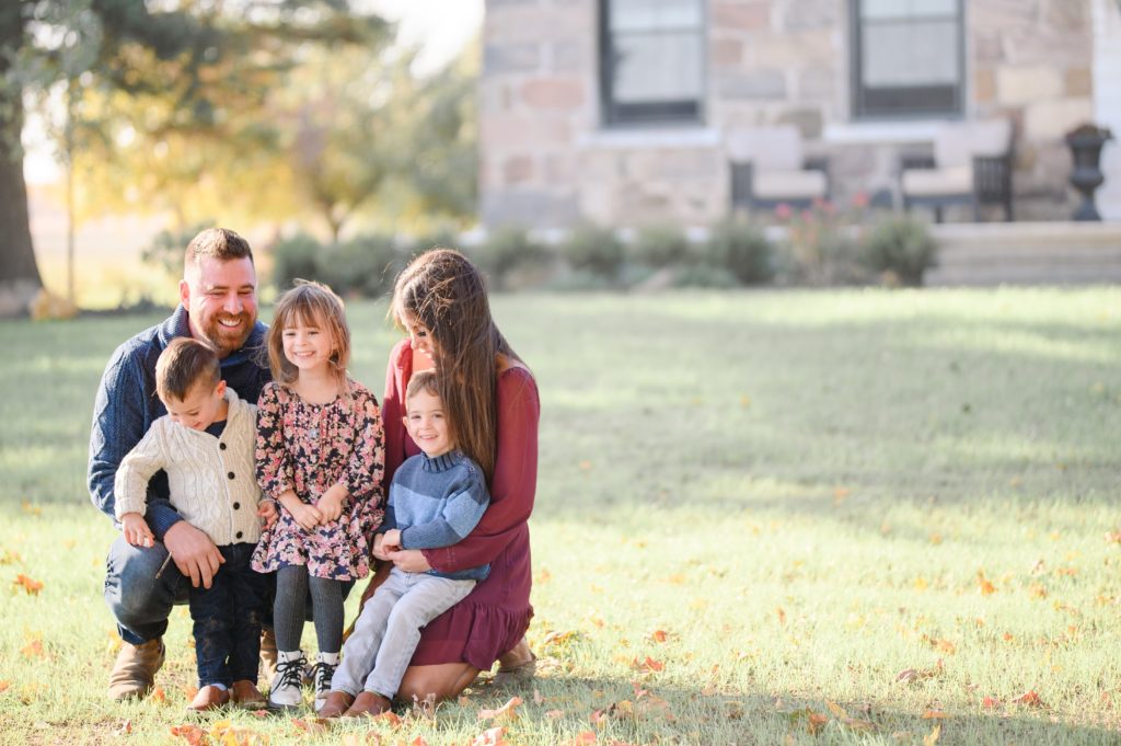 Aiden Laurette Photography | couple pose with family 