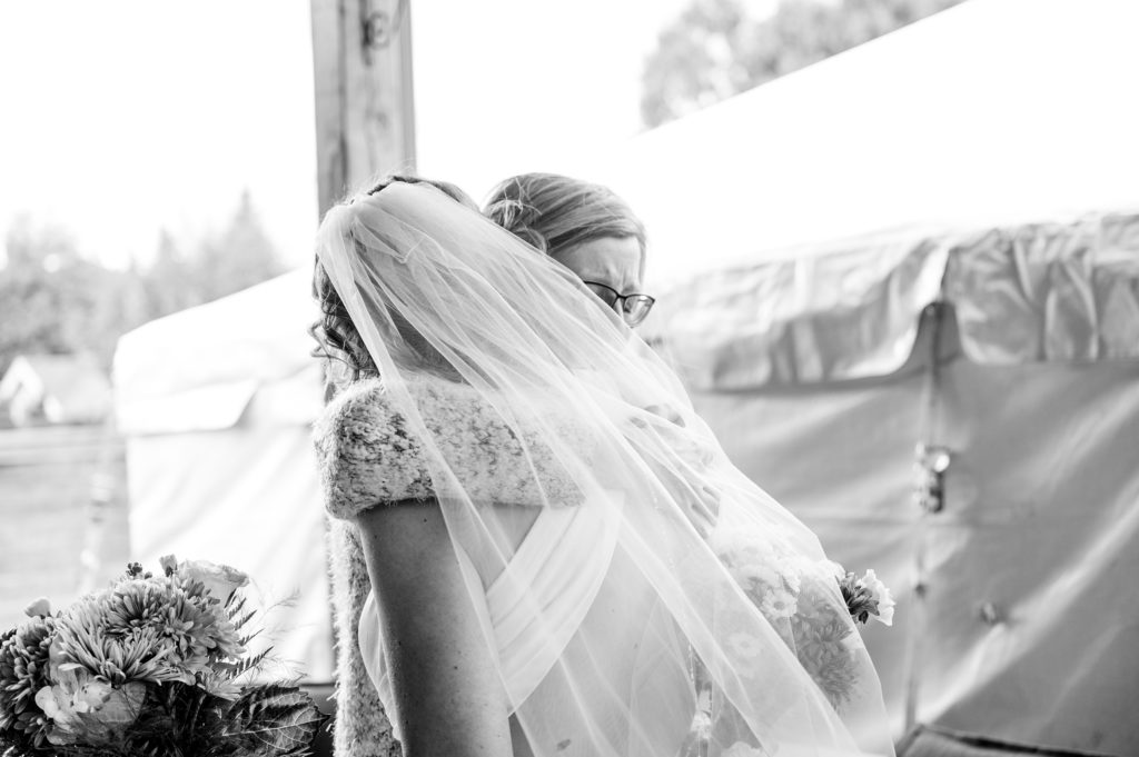 Aiden Laurette Photography | bride hugs woman in London Ontario