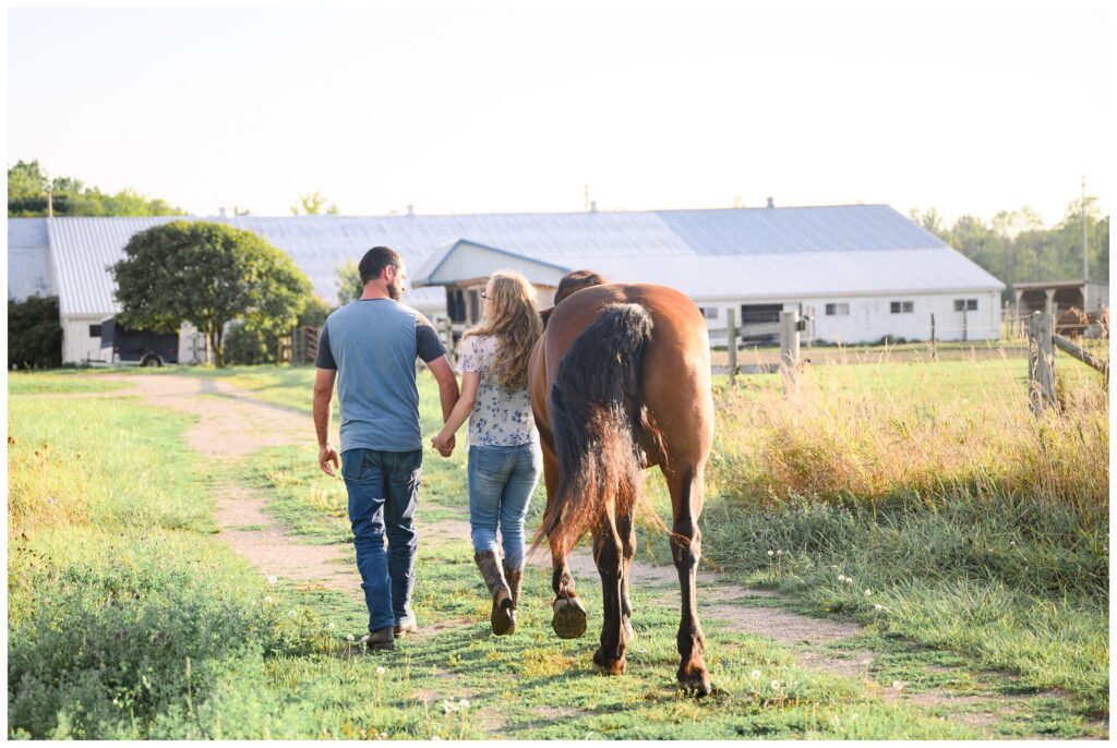 Aiden Laurette Photography | couple poses with horse