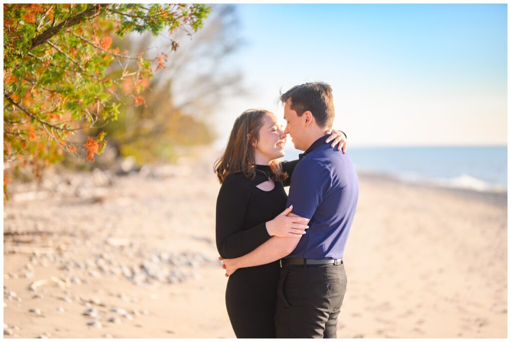 Aiden Laurette Photography | couple poses on beach