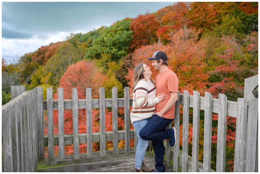 Aiden Laurette Photography | couple poses on bridge