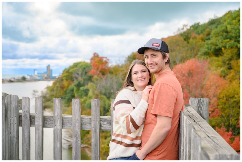 Aiden Laurette Photography | couple poses on bridge