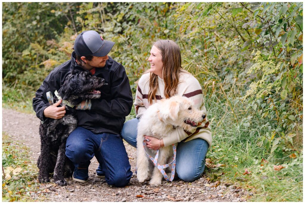 Aiden Laurette Photography | couple poses with dogs