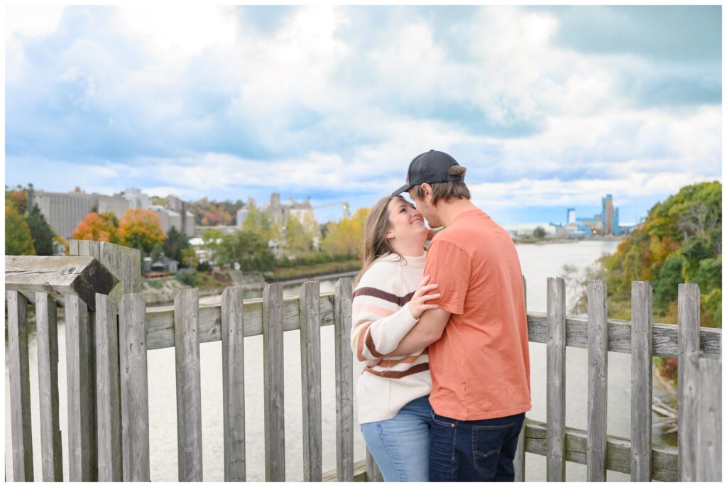 Aiden Laurette Photography | couple poses on bridge